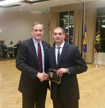 Chief Michael Sarlo presented Kenneth Alversa with the Police Officer of the Year award last week. Chief Michael Sarlo presented Kenneth Alversa with the Police Officer of the Year award last week.
