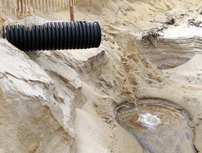 Stormwater runoff onto the ocean beach at Surfside Place in Montauk earlier this year showed potentially harmful bacteria at a level more than 130 times greater than a federal health standard. Stormwater runoff onto the ocean beach at Surfside Place in Montauk earlier this year showed potentially harmful bacteria at a level more than 130 times greater than a federal health standard.