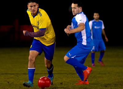 Donald Martinez, at left, scored two goals in the 7-on-7 men’s soccer final for F.C. Tuxpan Monday, while Nick Escalante of Tortorella Pools, at right, also had two. Tuxpan was the winner, though, by a score of 7-2.