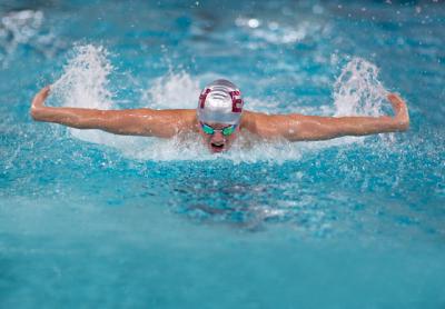 Ethan McCormac swam a state-qualifying time in the 100-yard butterfly at the Y in the meet with Ward Melville on Dec. 5.