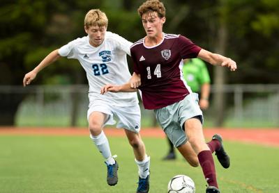 Zane Musnicki (14), ostensibly a defender, has been an offensive threat too.