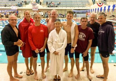 The Y.M.C.A. East Hampton RECenter squad that competed in a recent masters swim meet included, from left, Joe Viviani, Angelika Cruz, Mike Wootton, Tim Treadwell, Ellen Clark, Andrey Trigubovich, Kelly McKee, Dick Monahan, and Ed Mulderrig.