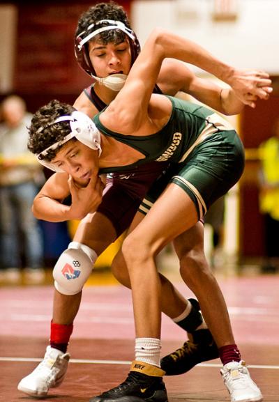 Santi Maya, foreground, an East Hampton freshman who lost to a county champion in the quarterfinal round of the Sprig Gardner tournament here Saturday, “has a very, very bright future.”