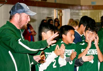 The honoree, at left, whose boys soccer team later that day extended its undefeated string, is working hard to make Bonac high school baseball competitive again.