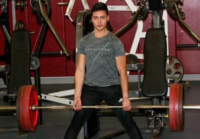 Richy Rangel lifts weights he can get rather than ones that are too heavy when practicing at the high school’s Kendall Madison fitness center.