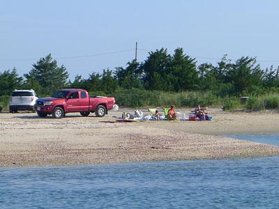 Some residents have objected to vehicles parking on the sand along the Three Mile Harbor shore at Maidstone Park and have asked the East Hampton Town Trustees to impose a ban.