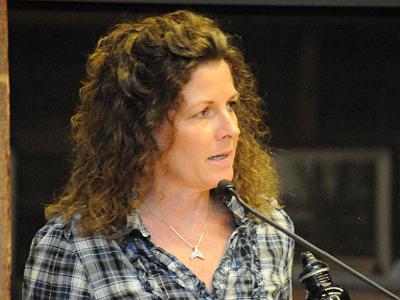 East Hampton Town Trustee Deborah Klughers spoke at a town board hearing on Tuesday to express her opposition to a proposed daytime ban on the consumption of alcohol at two Amagansett beaches. East Hampton Town Trustee Deborah Klughers spoke at a town board hearing on Tuesday to express her opposition to a proposed daytime ban on the consumption of alcohol at two Amagansett beaches.
