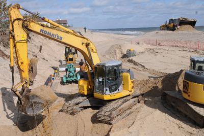 Mollie Zweig has won one round in a court fight over whether she can line the beach-front bluff at her East Hampton Village property with a 166-foot-long wall of stone. Mollie Zweig has won one round in a court fight over whether she can line the beach-front bluff at her East Hampton Village property with a 166-foot-long wall of stone.