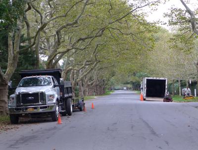 Trucks in a no-parking zone on Lily Pond Lane in East Hampton Trucks in a no-parking zone on Lily Pond Lane in East Hampton