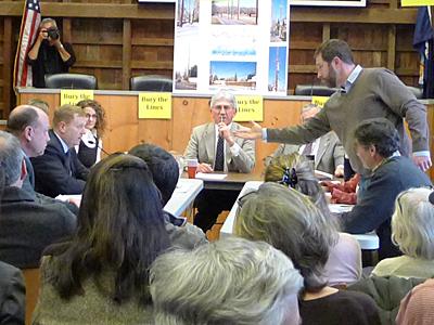 Jeremy Samuelson extended his hand at a meeting Wednesday with PSEG Long Island officials, hoping for a gesture of good faith from the utility's president, David M. Daly, who declined. Jeremy Samuelson extended his hand at a meeting Wednesday with PSEG Long Island officials, hoping for a gesture of good faith from the utility's president, David M. Daly, who declined.