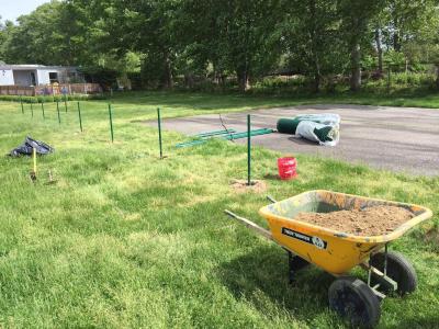 A crew from Smart Sports Surfacing began working this week on the fence that will surround the junior sports field.