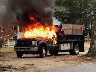 The owner of this truck parked on Neck Path in Springs returned home to find it in flames. The owner of this truck parked on Neck Path in Springs returned home to find it in flames.