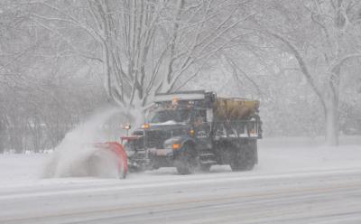 Plows were out in force on Monday to clear snow from the roads.