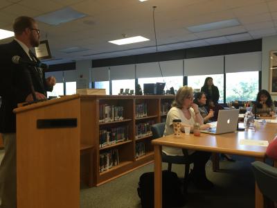 Larry Salvesen of BBS Architects, left, discussed "add-on" construction items with the Sag Harbor School Board on Tuesday, which caused some confusion among board members who thought some of the add-on items were to have been included as definite components of the district's current construction projects.
