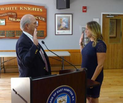 Rebecca Molinaro, the village clerk, swore in Arthur Graham to the East Hampton Village Board, on Wednesday. Rebecca Molinaro, the village clerk, swore in Arthur Graham to the East Hampton Village Board, on Wednesday.