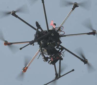 An airborne drone An airborne drone