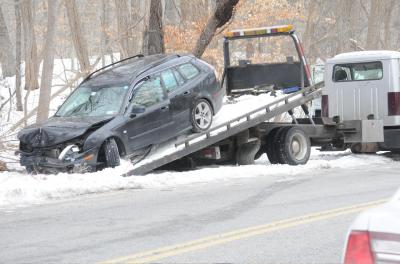 East Hampton Town police had a car that crashed into the woods pulled out after the driver was taken to Southampton Hospital. East Hampton Town police had a car that crashed into the woods pulled out after the driver was taken to Southampton Hospital.