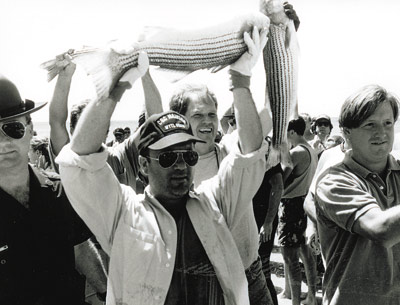 East Hampton baymen and supporters, including, from left, the singer Billy Joel, Arnold Leo of the town Baymen’s Association, and East Hampton Town Supervisor Tony Bullock, protested state conservation laws.