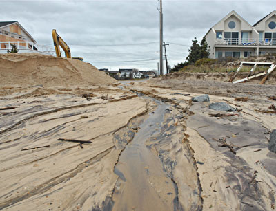 In Montauk on Friday water continued to drain from low-lying areas back toward the ocean. In Montauk on Friday water continued to drain from low-lying areas back toward the ocean.
