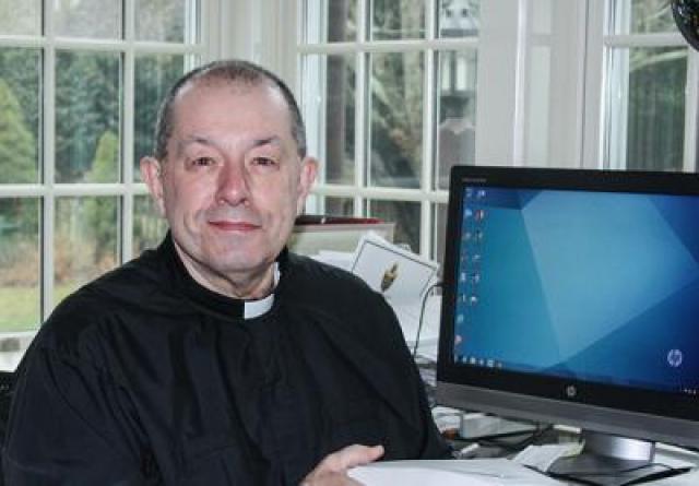 The Rev. Denis Brunelle spoke forcefully about the dignity and integrity of all people.