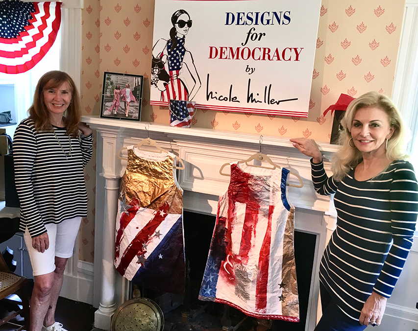 Nicole Miller, with Pamela Wright, right, co-founder of the Museum of Democracy, sold one of these hand-painted paper dresses over the weekend at her pop-up shop in the Bridgehampton Museum.