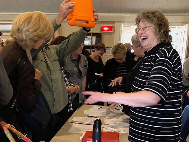 Heather Anderson, outgoing president of the Springs Historical Society and de facto director, chief cook, and bottle-washer of the Springs Library, was all smiles on Sunday as would-be members of the society lined up to join.