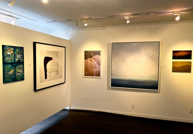 Works by Mark Perry, Hiroyuki Hamada, Insuh Yoon, Kurt Giehl, and Linh Vivace are hung together in the show. Below, Rosario Varela’s “Ancestors” sculpture has a metaphorical relationship to the exhibition’s theme.  Seen in detail to the right are works by Christine McFall and Lesley Obrock.