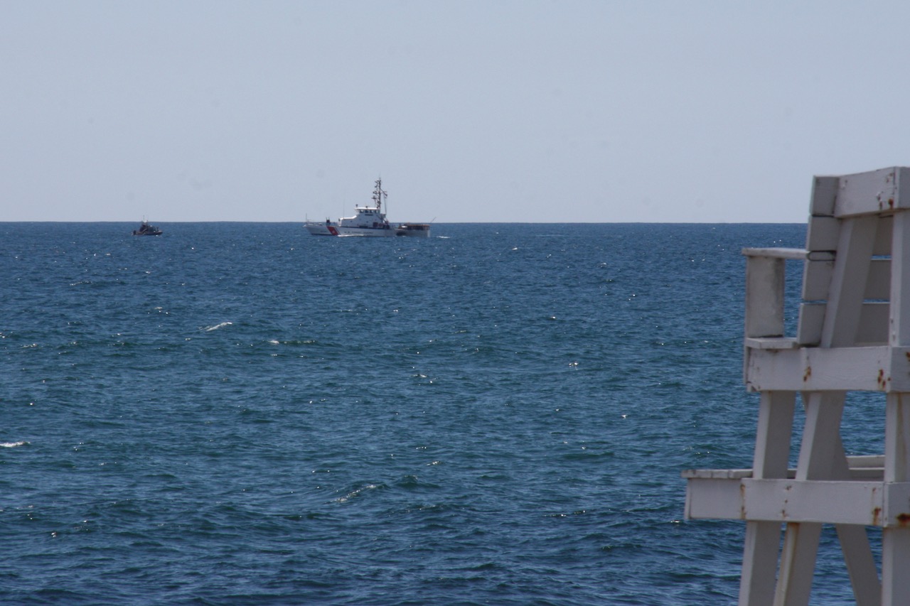 Coast Guard and police boats conducted grid-pattern searches off the Amagansett shoreline throughout the week for the missing plane crash victims.