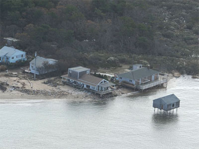 These Lazy Point vacation houses, already exposed by erosion, were left in a far more precarious position by Hurricane Sandy.
