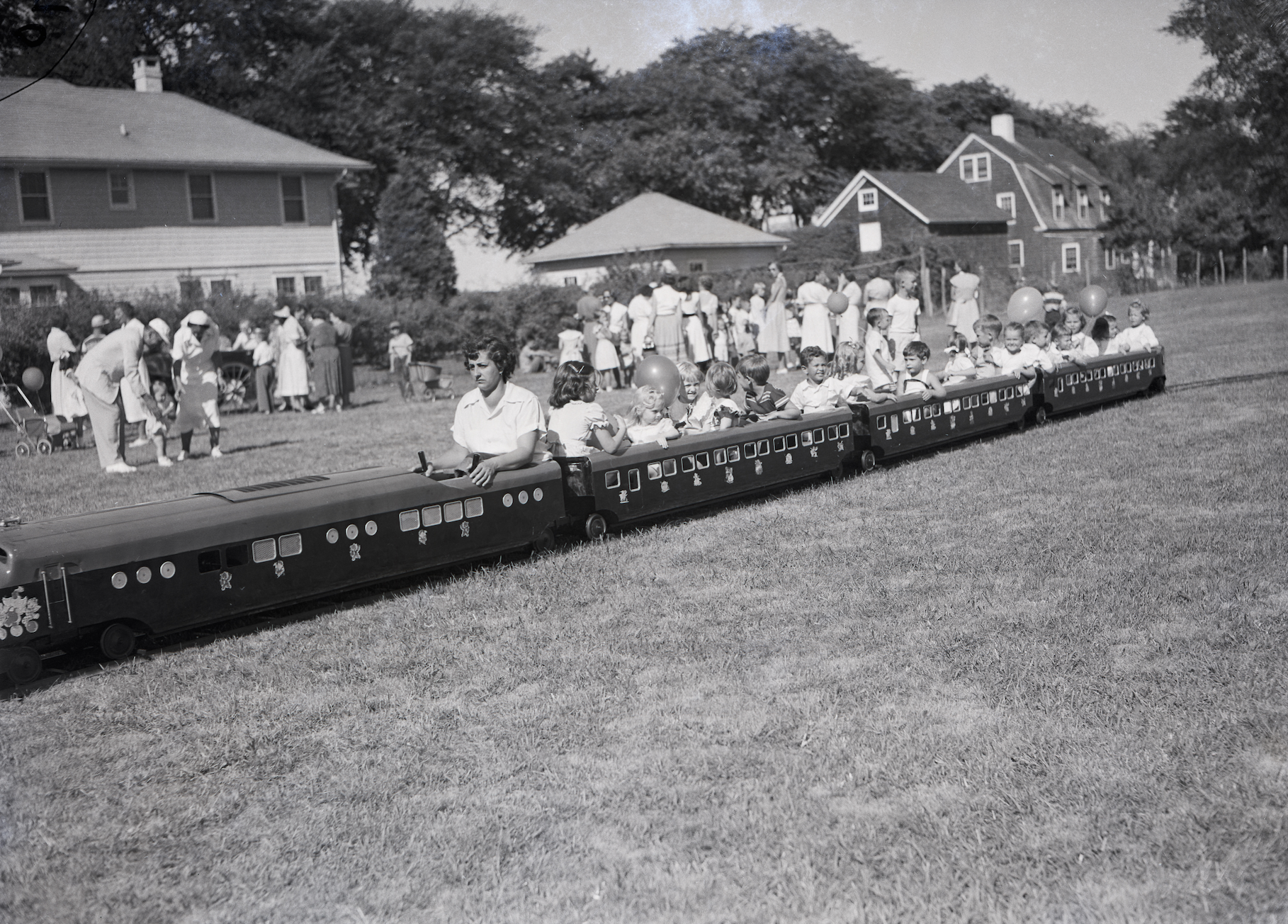 Riding the choo-choo, L.V.I.S. Fair, c. 1950s East Hampton Star archive