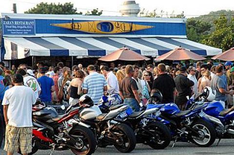 A town law limiting the number of people allowed to congregate outside restaurants and bars like Cyril’s, above, could be put in place by the summer.