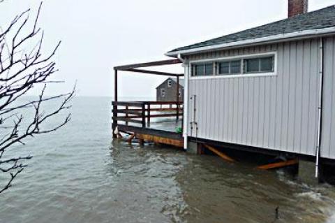 For the second time in two months, an extremely high tide in Gardiner’s Bay surrounded a house off Mulford Lane at Lazy Point, where the East Hampton Town Zoning Board of Appeals recently approved a revetment.