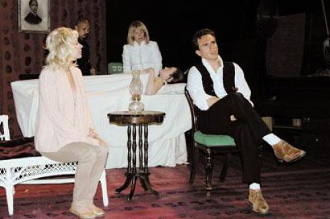Members of the cast of “In the Next Room,” including, from left to right, Licia James Zegar, Glenn Thomas Cruz (in back), Bonnie Grice, Caroline Smith (lying down), and Christian Scheider, rehearsed last Thursday.