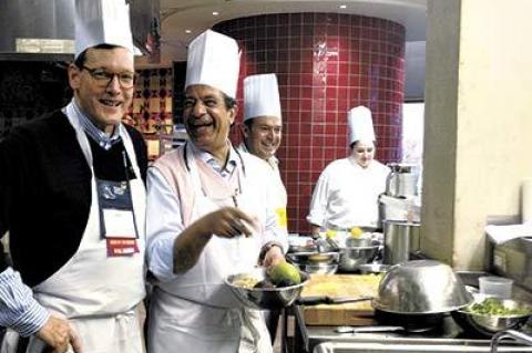 King Hussein, center, was the benevolent leader of Laura Donnelly’s team during a Culinary Institute of America boot camp recently. With him was Ken Koch, left, another South Fork participant in the program.