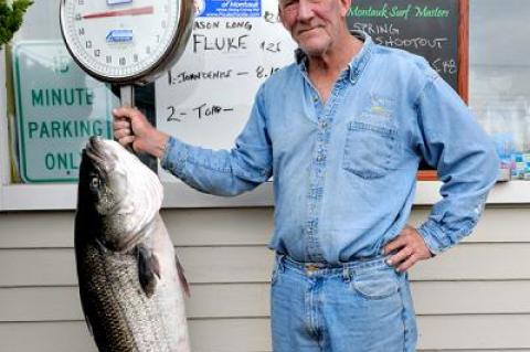 Glenn Grothmann of Montauk, a k a the Sandman, caught this hefty 51.68-pound striped bass on Friday.