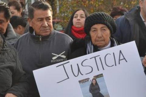 The parents of Lilia Aucapina, Raquel and Miguel Parra, listened on Tuesday as speakers called on police to reopen the investigation into her death.