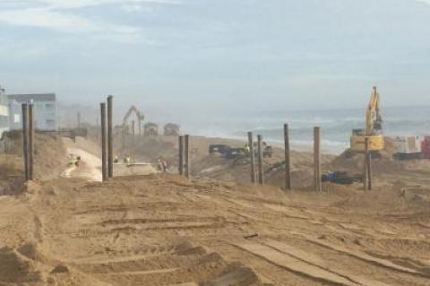 Work continues on the Army Corps of Engineers’ project on the downtown Montauk beach, where a sandbag seawall is taking shape.