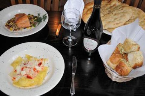 Signature garlic rolls and focaccia complement meals at Cappelletti in Noyac.