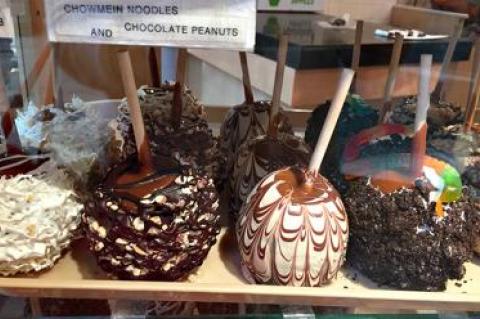 At the Minneapolis airport, food options include Aunt Annie’s pretzels and candy-coated apples.