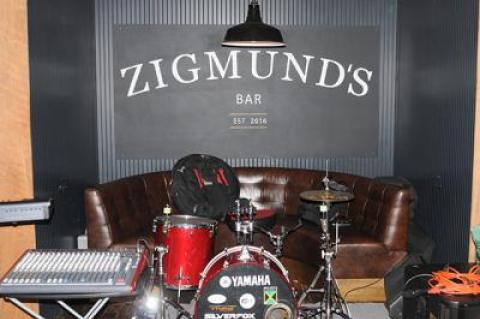 Zigmund’s bar was empty the night our reviewer and photographer arrived, but it was still a “festive and tasty experience.”