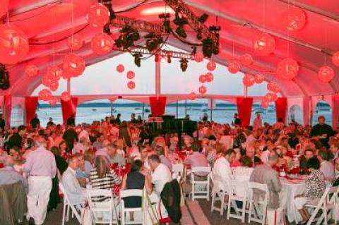 Bay Street Theater’s annual gala enjoys a three-sided water view from under a tent on Long Wharf, which closes the pier to parking for several days.