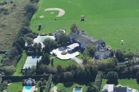 The Town of Southampton reached a settlement with Howard Lutnick over a barn and a basketball court that clear up longstanding issues in one of the first - and worst - conservation easements ever written in the town, officials said.