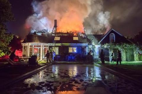 The roof and second floor of a house on Talmage Farm Lane in Springs were damaged by smoke and fire Saturday night.