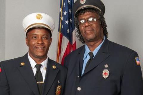 Jamalia Hayes, the East Hampton Fire Department’s second assistant chief, at left, followed in the footsteps of his father, Dudley Hayes, by joining the department in 2005.