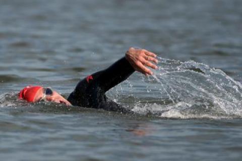 Michael Petrzela was again first out of the water in Fighting Chance’s longest swim, a 2-miler this time.
