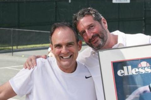 Paul Annacone, left, said if Scott Rubenstein, E.H.I.T.’s managing partner, had availed himself 30 years ago of the advice in “Coaching for Life,” he would have defeated him in shuffleboard at Orange Lake.