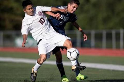 Justin Carpio (10) assisted on Wilmur Guzman’s game-tying header in the second half of the game here with Amityville.