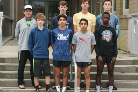 County champs: front row, from left, Nicolas Villante, Geo Espinoza, Omar Leon, and Robert Weiss; rear row, the coach, Kevin Barry, Frank Bellucci, Ryan Fowkes, and Ethan McCormac.