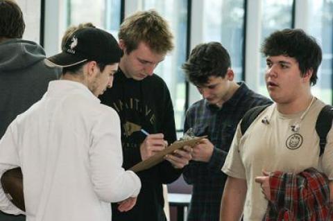 The Jan. 24 meeting in the high school's cafeteria drew 24 prospective football players, each of whom was asked to recruit a friend or two.