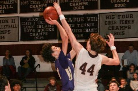 Chris Stoecker, East Hampton's tallest player at 6 feet 7 inches, was a force underneath in the Jan. 23 game here with Islip.